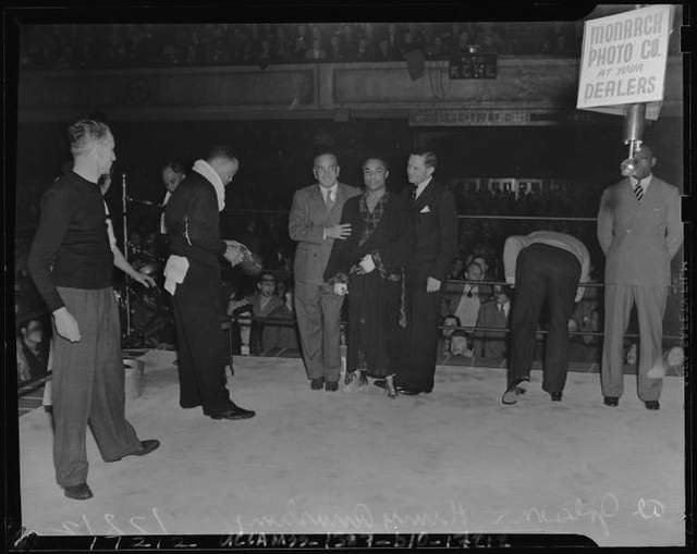 Henry Armstrong and his manager in the boxing ring
