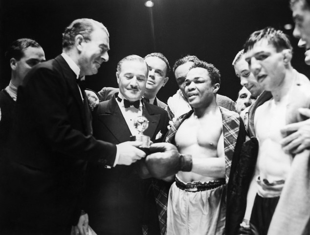 Henry Armstrong Receiving Trophy