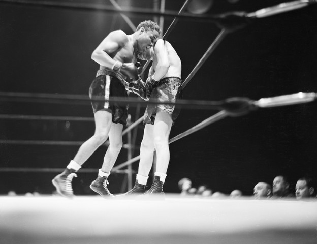 Henry Armstrong Punching Lou Ambers