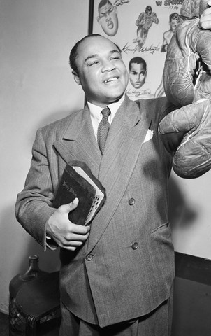 Henry Armstrong with Bible and Boxing Gloves