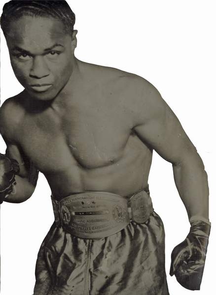 Henry Armstrong wearing his championship belt