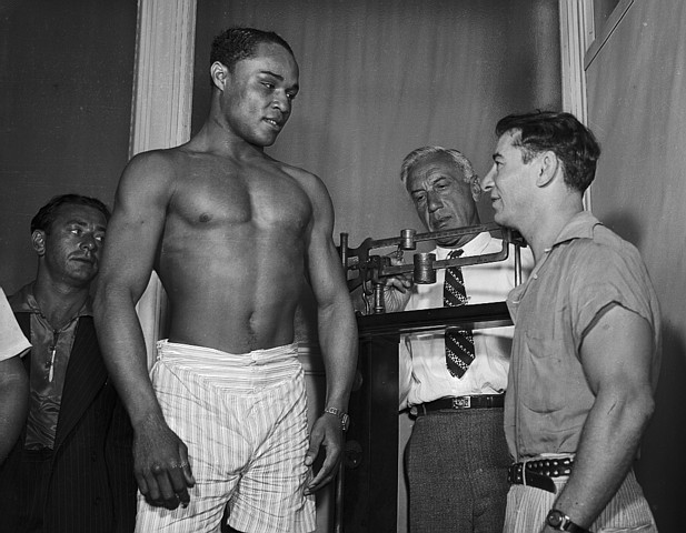 Henry Armstrong Being Weighed